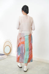 Pink sheer vest in asymmetrical cut