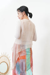 Pink sheer vest in asymmetrical cut