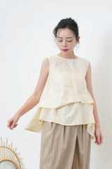Butter vest with details pleats hem