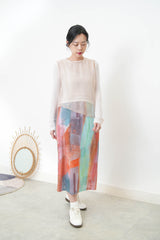 Pink sheer vest in asymmetrical cut