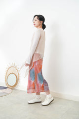 Pink sheer vest in asymmetrical cut