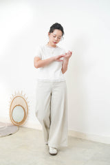 White texture top w/ mesh ruffle trimming