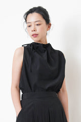 Black vest w/ gather collar strings