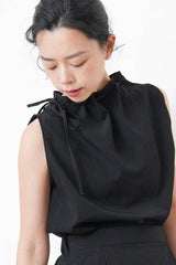Black vest w/ gather collar strings