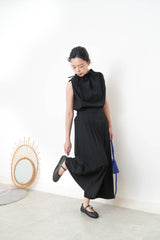 Black vest w/ gather collar strings