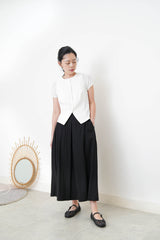 White minimal vest in split hem