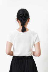 White thin knit top w/ rolled collar