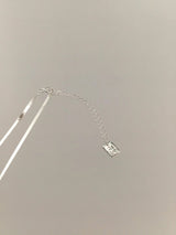 Premium silver necklace in minimal ribbons