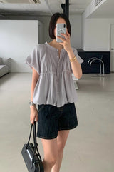 Grey smooth blouse in balloon shape
