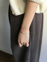 Red rope with silver beads bracelet