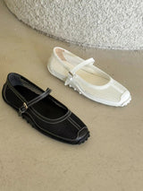 Black outlined mary jane ballet flats