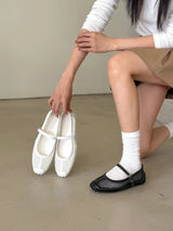 Black outlined mary jane ballet flats