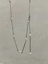 Silve pearl necklace w/ pendant design