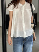 Yellow blouse in lace round neck