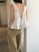 White dotted pattern vest w/ peplum hem