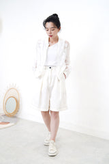 White bomber jacket in sheer floral pattern