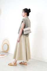 Grey leather cross body bag in thin strap