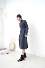 Charcoal knit dress in pleats