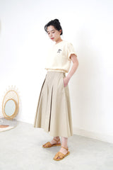 Cream embroidery top in elastic hem