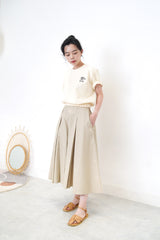 Cream embroidery top in elastic hem