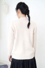 Ivory knit top w/ lace fringe detail