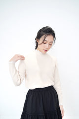 Ivory knit top w/ lace fringe detail