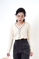 Ivory v neck cardigan in button details