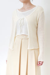 Cream pleats skirt w/ buttons
