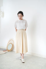 Cream pleats skirt w/ buttons