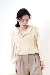 Ivory v neck knit vest in twist pattern