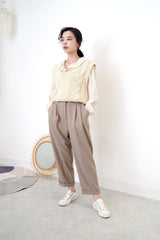 Ivory satin blouse in elastic peplum hem