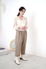 Ivory v neck knit vest in twist pattern