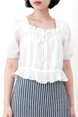 White square neck blouse in ruffle hem