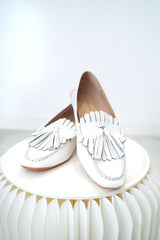 White fringe leather loafer