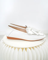 White fringe leather loafer