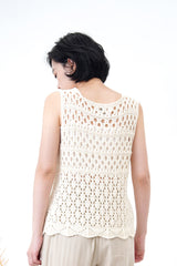 Ivory crochet vest in wavy hem