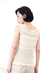Ivory crochet vest in wavy hem