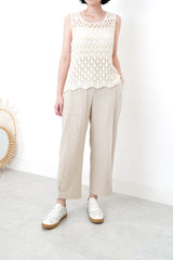 Ivory crochet vest in wavy hem