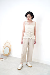 Ivory crochet vest in wavy hem
