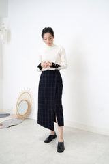 Black checked wool skirt in asy. hem