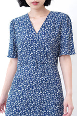 Navy v neck floral dress w/ waist string