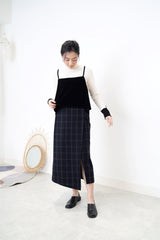 Black checked wool skirt in asy. hem
