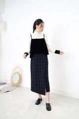 Black checked wool skirt in asy. hem