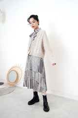Grey wool cardigan in twist details pattern