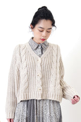 Grey wool cardigan in twist details pattern