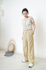 Beige high quality trousers w/ strap details