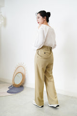 Beige high quality trousers w/ strap details