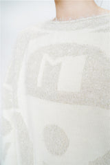 White sweater in silver glittering
