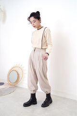 Nude pencil cut trousers in pleats hem