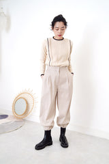 Nude pencil cut trousers in pleats hem